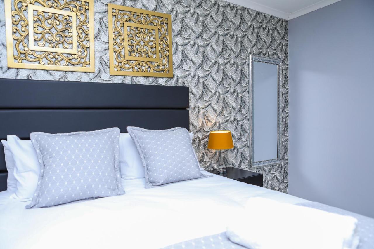 Delux Guesthouse Volksrust Экстерьер фото