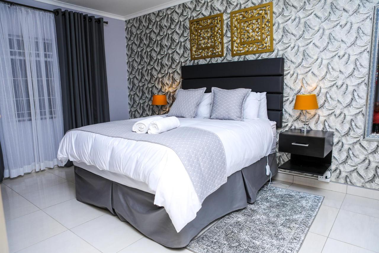 Delux Guesthouse Volksrust Экстерьер фото